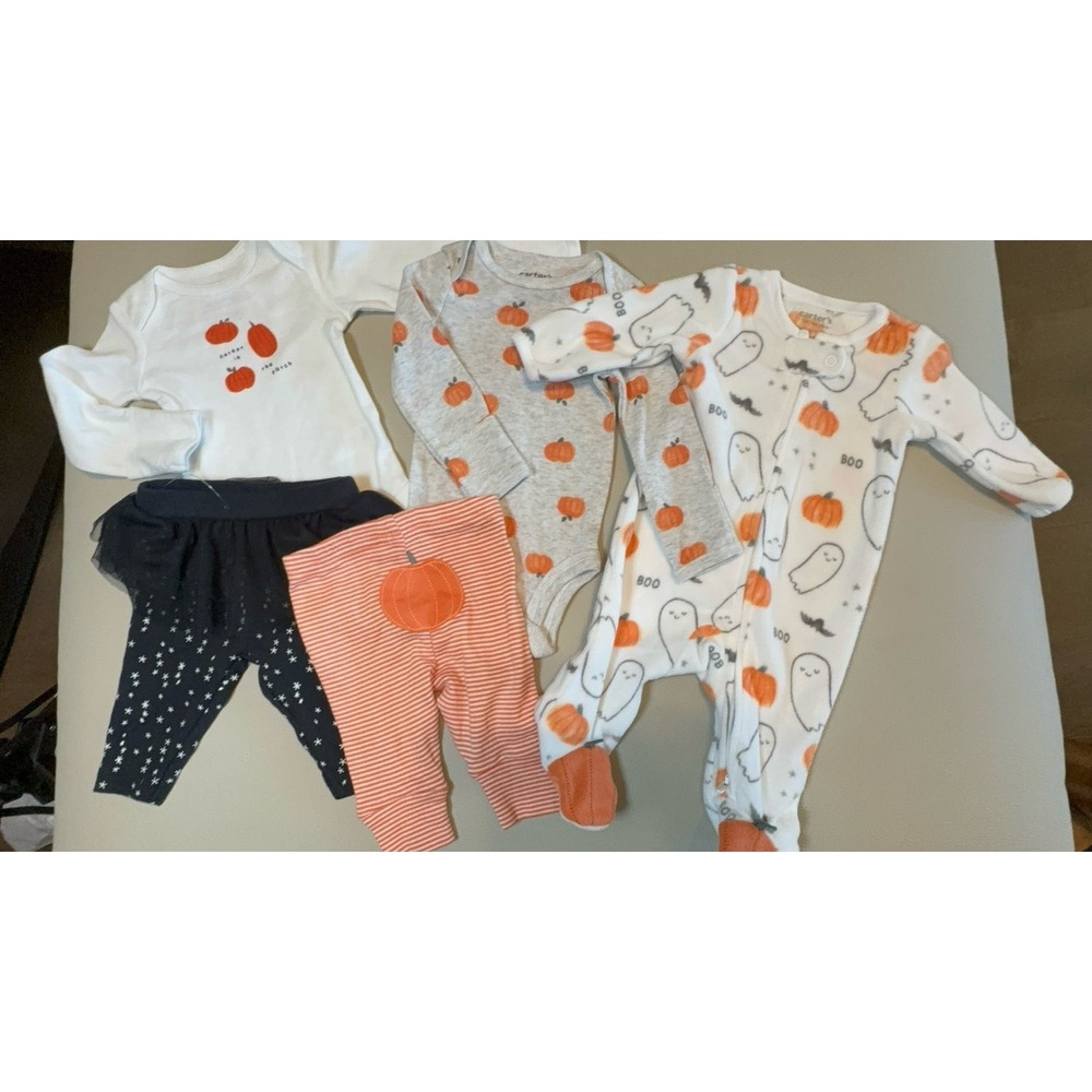 Baby girl size NB Carter's pumpkin Halloween clothing bundle.